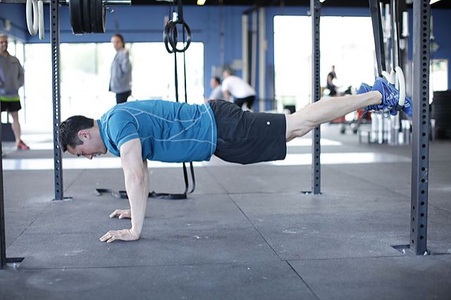 Photo of Suspended Reverse Crunch exercise